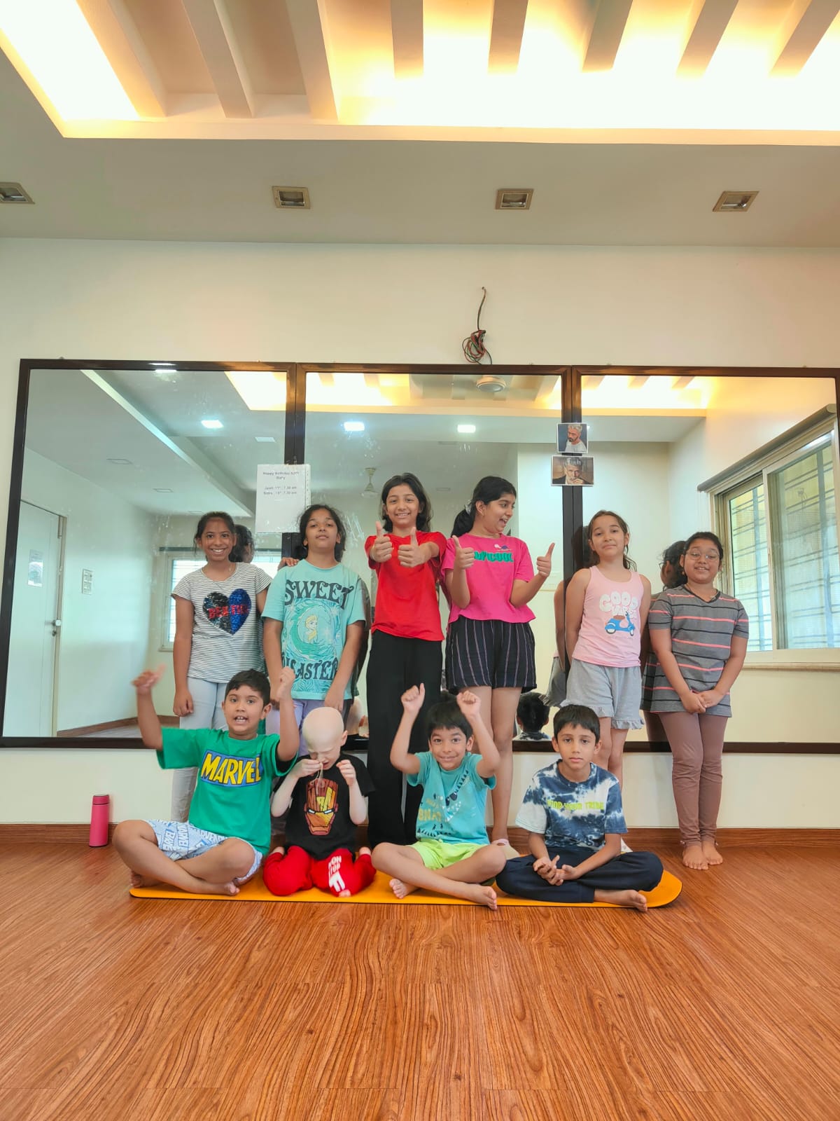 Children stretching in yoga class at Soulz Fitness studio Kondhwa Pune